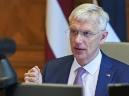 Премьер Латвии считает действия российских войск в Украине геноцидом