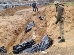 В Киевской области обнаружили восемь массовых захоронений мирных жителей, убитых россиянами