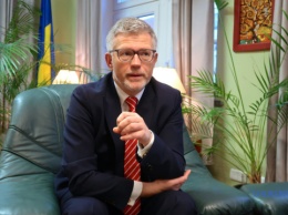 Посол Мельник: Мы шокированы запретом на украинские флаги в Берлине 8-9 мая