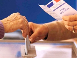 На парламентских выборах во Франции блок Макрона минимально опередил соперников