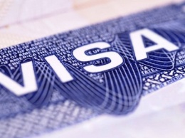 МИД разрабатывает механизм получения виз для россиян