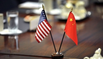 Китай провел совещание с банкирами по защите от возможных санкций США - FT